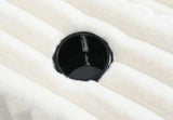 Side profile of the Luna Ribbed White Oversized Chaise Lounge Chair showing deep seating design.