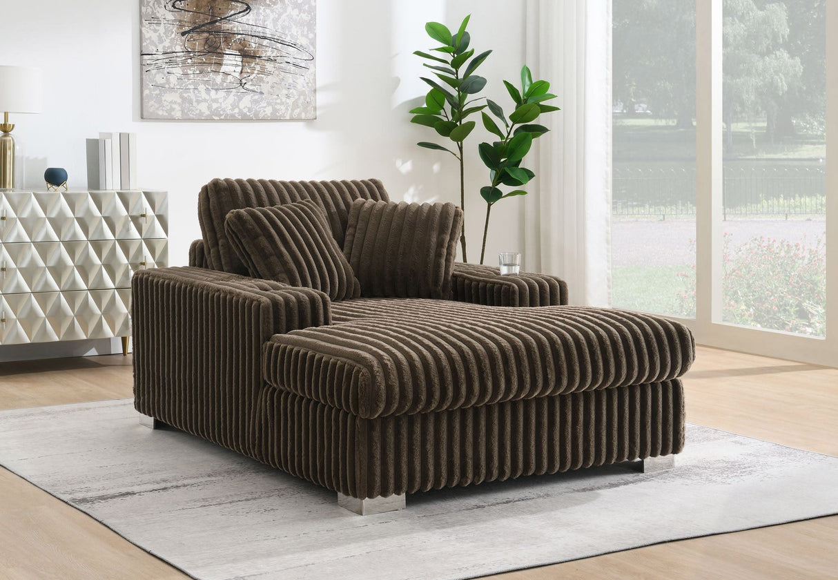Angled view of the Luna Ribbed White Oversized Chaise Lounge Chair highlighting its oversized proportions.