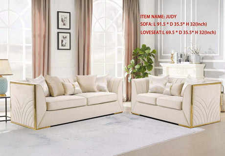 Modern living room arrangement featuring the Judy sofa and loveseat set with metallic gold trim.