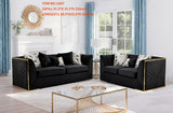 Judy grey velvet sofa and loveseat set with vertical channel tufting and gold base accents.