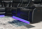 Overhead view of black reclining sectional with cup holders