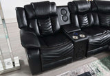 Padded armrests and integrated cup holders on theater sofa