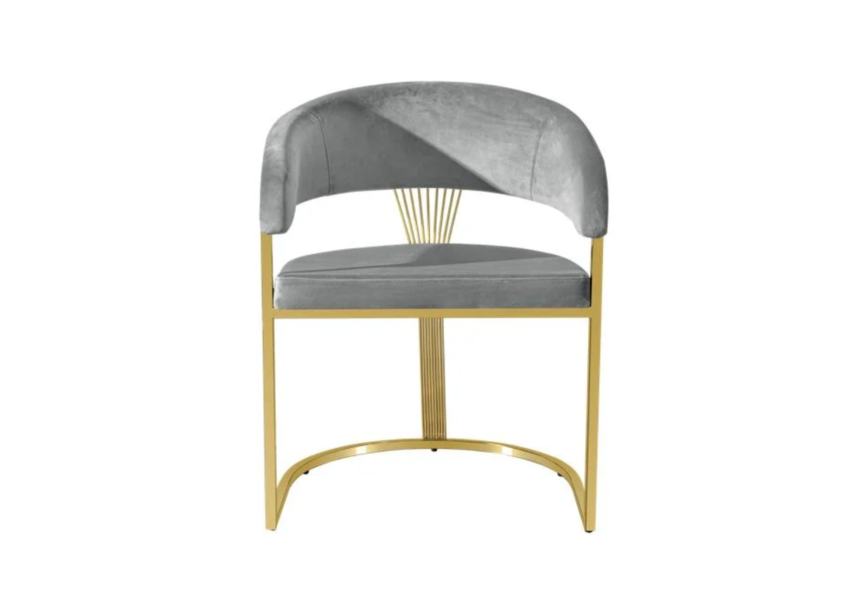 Close-up of grey velvet upholstery on modern dining chair.