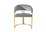 Close-up of grey velvet upholstery on modern dining chair.