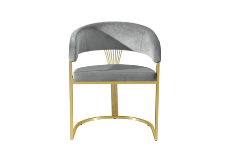 Close-up of grey velvet upholstery on modern dining chair.