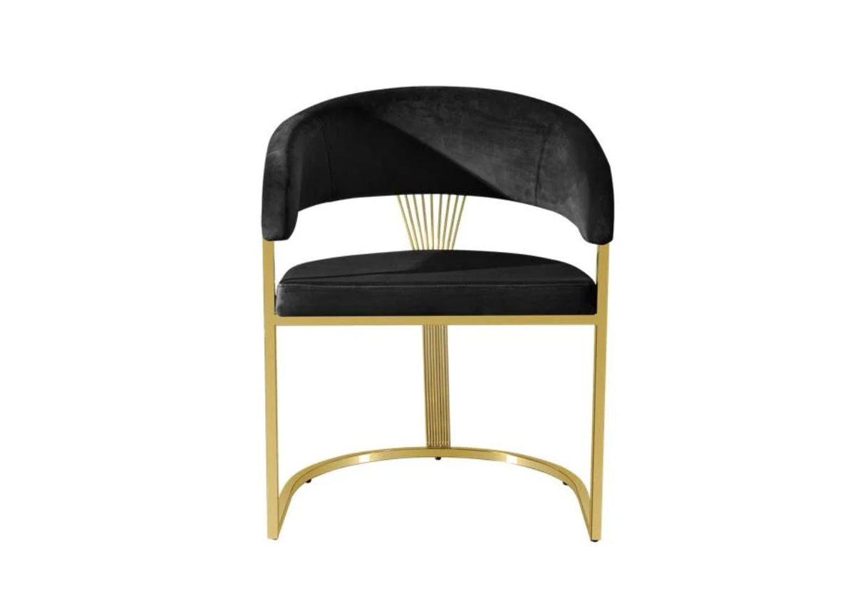 Detail of curved gold metal legs on FOAK dining chair.