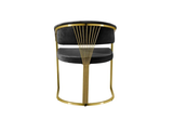 Side profile of open-back Annie dining chair in grey and gold.