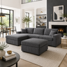 A modern gray corduroy sectional sofa with a matching ottoman in a stylishly decorated living room.