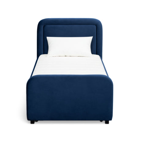 Briella Twin Trundle Bed styled with decorative throw pillows and neutral bedding