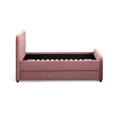 Pull-out trundle unit gliding on smooth casters beneath the main twin bed frame