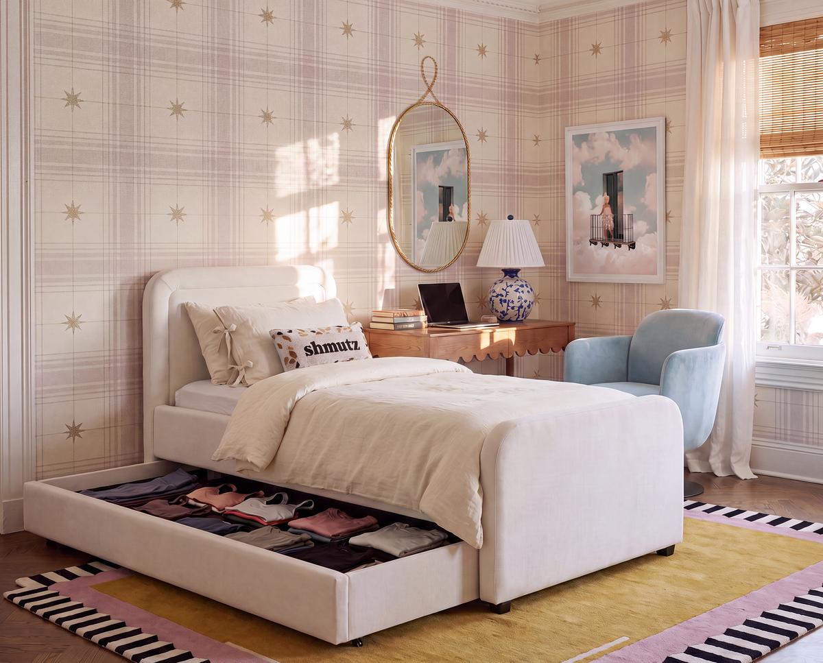 Briella Trundle Bed with both twin sleeping surfaces dressed with modern linens
