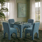 Architectural detail of fully upholstered arched leg structure on Tomlin chair