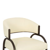 Angled perspective of the Cream vegan leather Tatum dining chair with black metal base