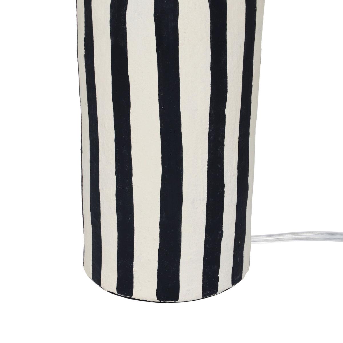 Side profile view of Maiori striped papier mache table lamp