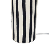 Side profile view of Maiori striped papier mache table lamp