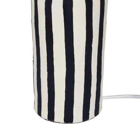 Side profile view of Maiori striped papier mache table lamp