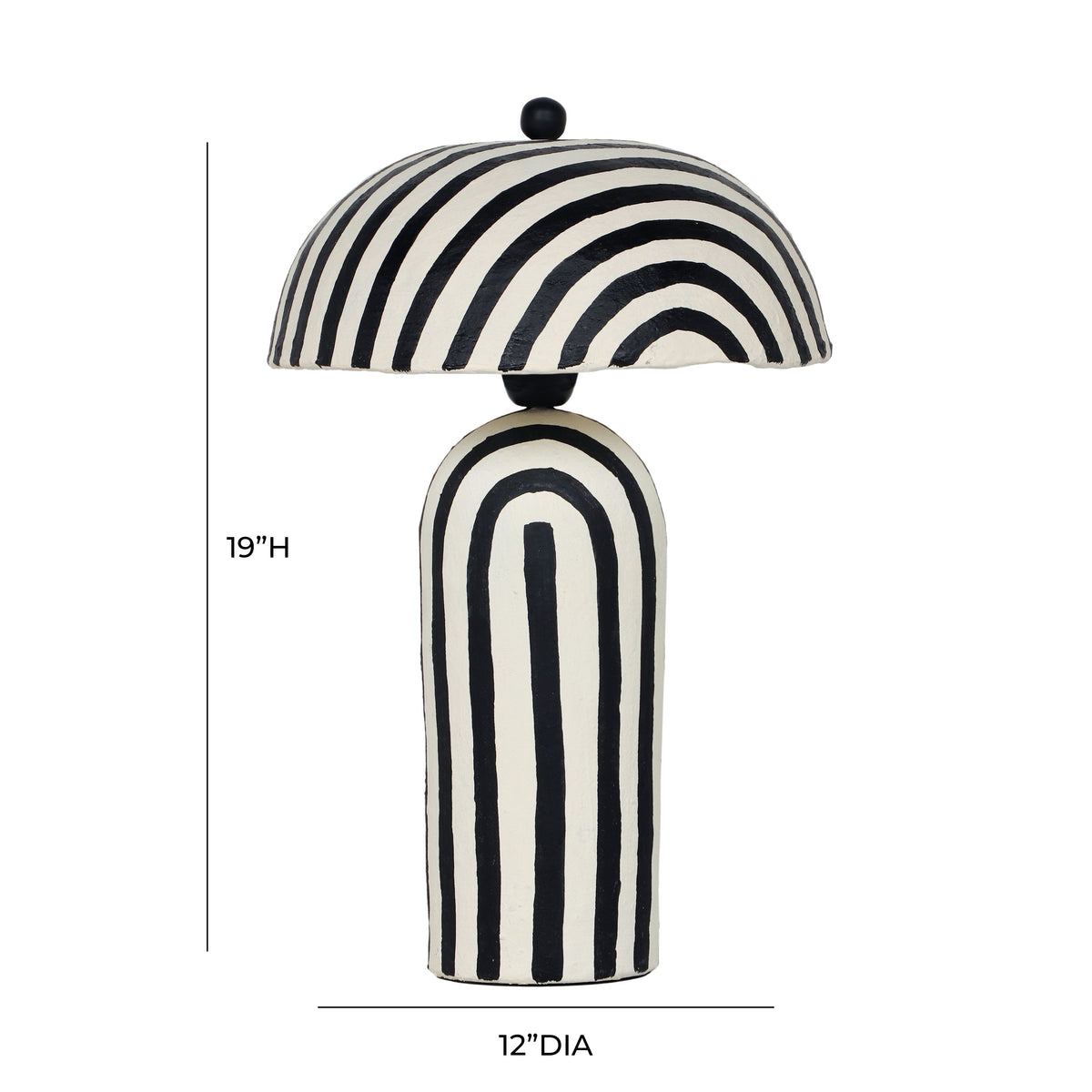 Maiori striped table lamp illuminated on contemporary wooden bedside nightstand