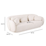 Misty Curved Boucle Sofa Displayed Beside Modern Accent Table