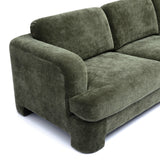 Seating comfort demonstration on Halsey low profile textured sofa