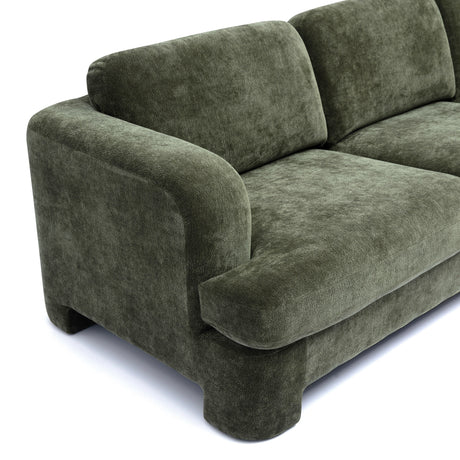 Seating comfort demonstration on Halsey low profile textured sofa