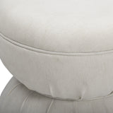 Tomlin Ruched Performance Fabric Game Ottoman in Cream in a contemporary interior living space