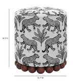 Dex transitional round footstool placed on neutral rug