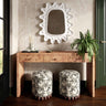 Dex round fabric ottoman from low perspective angle
