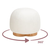 Oopa Swivel Ottoman placed near a window showcasing fabric depth