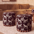 Dex round ottoman side profile showing curved silhouette
