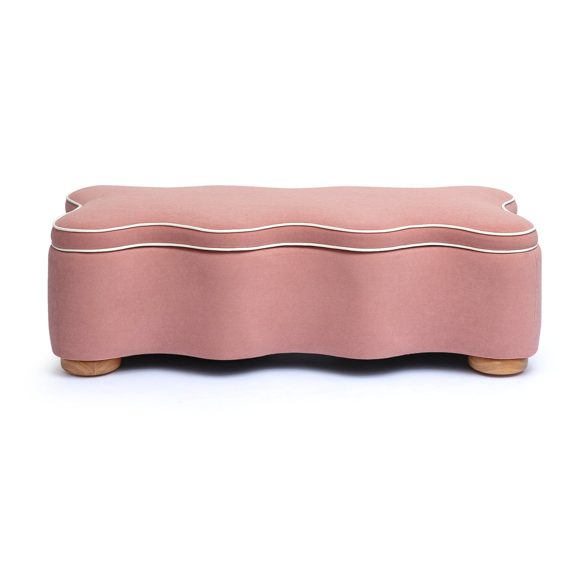 Side angle view of pink Thalia scalloped storage bench