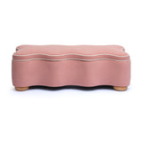Side angle view of pink Thalia scalloped storage bench