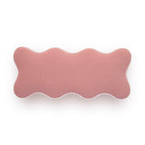 Pink Thalia storage bench placed in a modern bedroom interior