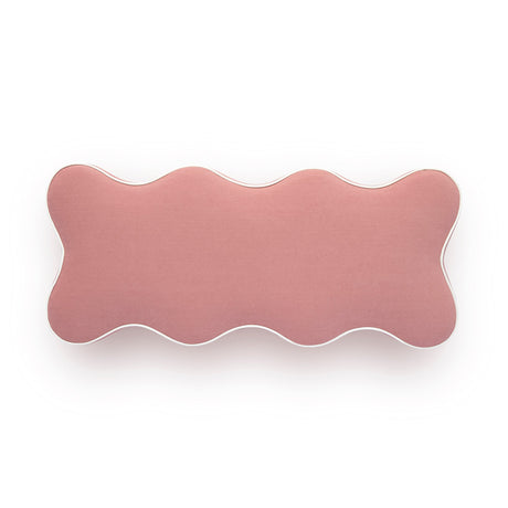 Pink Thalia storage bench placed in a modern bedroom interior