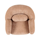 Coordinating pill-shaped accent pillow on Misty cream accent chair