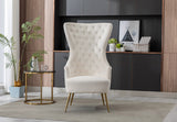 Gray velvet armchair with high back for ergonomic support