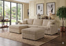 Close-up of the textured black corduroy upholstery and deep seating cushions of the FOAK sectional.