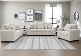 Janet 3-piece living room set featuring a sofa, loveseat, and armchair in textured fabric upholstery with wide track arms.