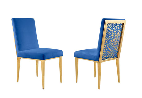 Close-up of the polished gold metal frame and black velvet seat of a FOAK dining chair.