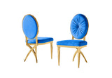 Side view of contemporary FOAK dining chair featuring blue velvet and cross-leg gold base.