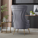 Front view of contemporary gray velvet armchair showing tufted backrest