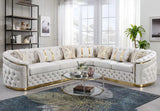 Close up of deep button tufted backrest on gray velvet sectional sofa