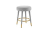 Side profile showing the minimalist silhouette of the FOAK counter stool.