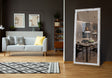 Aria full-length LED floor mirror with crystal accents and integrated lighting in a bedroom setting