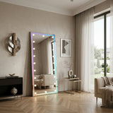 Rosalinda full length standing mirror with integrated LED studio lighting in a modern interior setting.