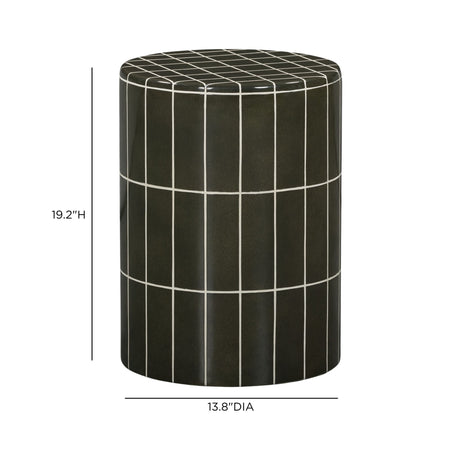Tatiana concrete side table situated next to contemporary sofa
