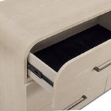 Three quarter room angle showing the sculptural silhouette of the 6 drawer dresser