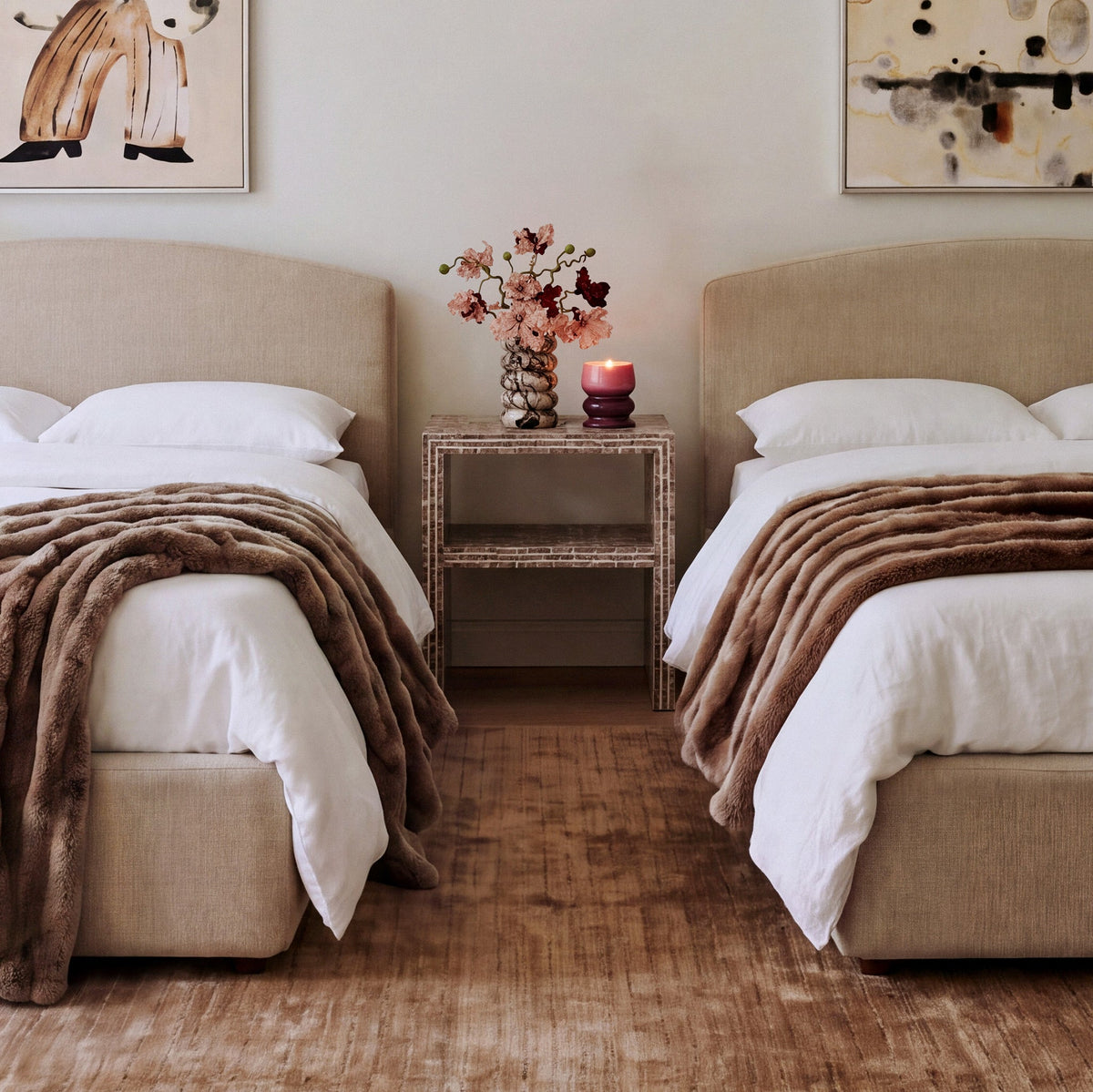 Close-up detail of textured cream chenille upholstery on Leah bed headboard