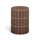 Tatiana concrete side table beside a pool lounge chair setup