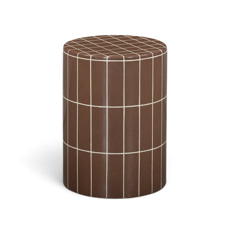 Tatiana concrete side table beside a pool lounge chair setup