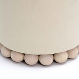 High angle view of Dex round footstool showing even top cushion